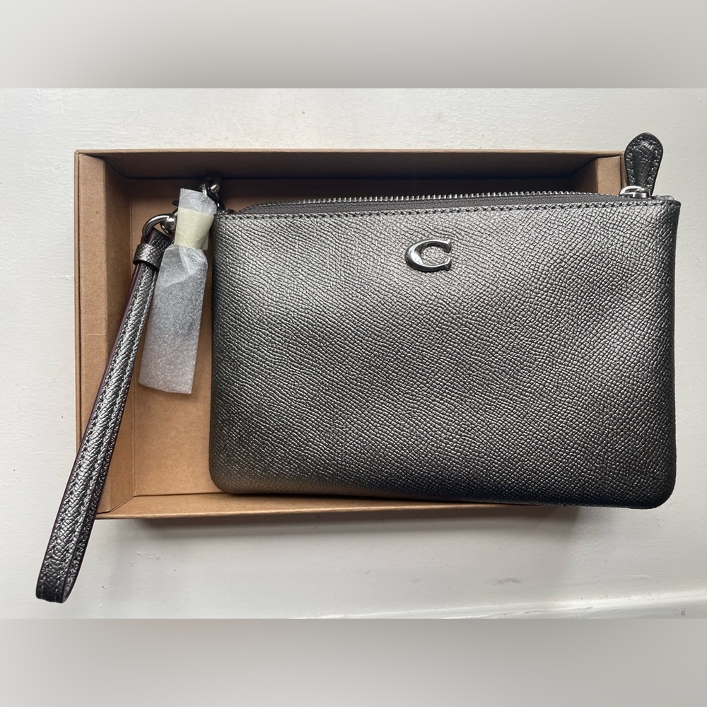 Coach Wristlet. Silver New with Tags